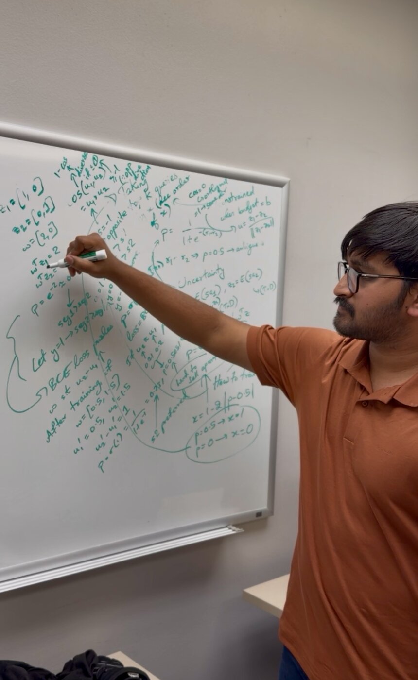 Harshith working through ML equations
